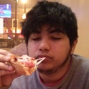 a picture of myself eating a nice hot and cheesy Chicago Deep Dish Pizza
